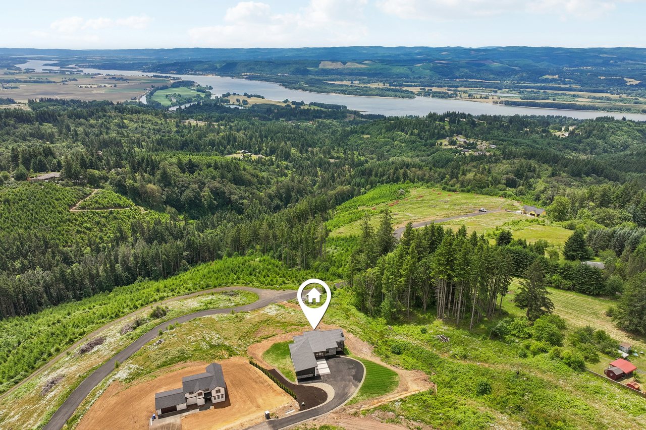 Aerial view of 340 Anderson Drive and the Columbia River landscape